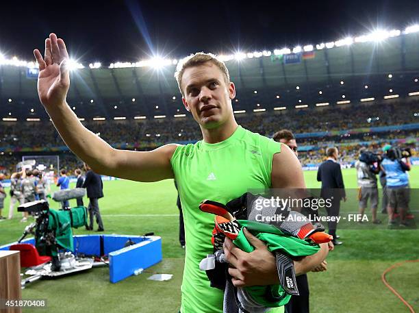 Manuel Neuer of Germany celebrates the 7-1 win while walking off the pitch after the 2014 FIFA World Cup Brazil Semi Final match between Brazil and...