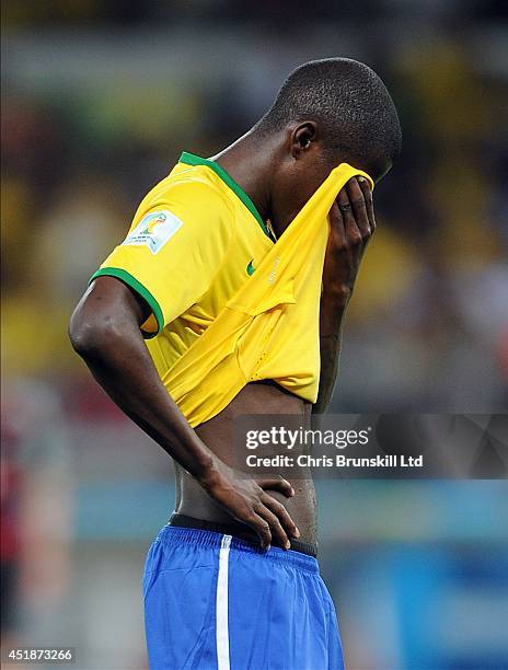 Ramires of Brazil reacts during the 2014 FIFA World Cup Brazil Semi Final match between Brazil and Germany at Estadio Mineirao on July 08, 2014 in...