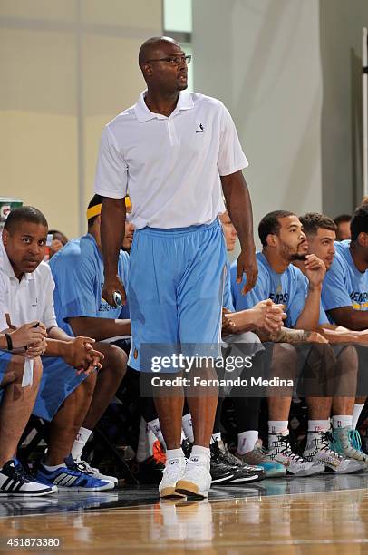 Assistant coach Shawn Respert of the Memphis Grizzlies coaches against the Orlando Magic during the game during the Samsung NBA Summer League 2014 on...