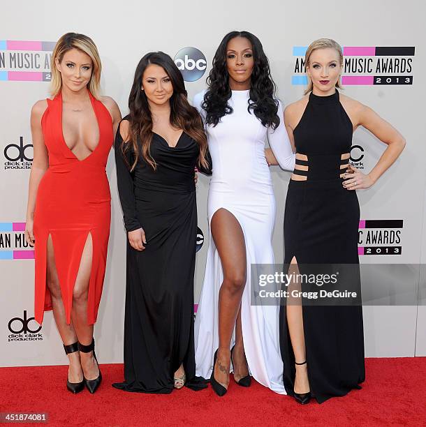 Singers Aubrey O'Day, Aundrea Fimbres, Dawn Richards and Shannon Bex of Danity Kane arrive at the 2013 American Music Awards at Nokia Theatre L.A....