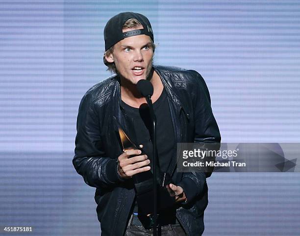 Avicii speaks onstage at the 2013 American Music Awards held at Nokia Theatre L.A. Live on November 24, 2013 in Los Angeles, California.