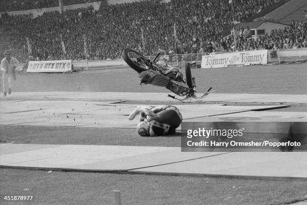 American motorcycle stunt rider Evel Knievel crashes on landing after jumping 13 AEC Merlin buses at Wembley Stadium, London, 26th May 1975. After...