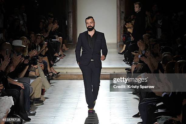 Julien Fournie acknowledges the audience during the Julien Fournie show as part of Paris Fashion Week - Haute Couture Fall/Winter 2014-2015 at...