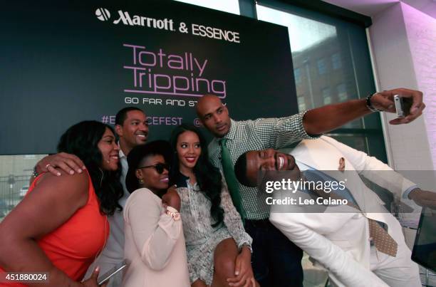 Laz Alonso, Angela Simmons, and Boris Kodjoe attend Totally Tripping Panel Discussion during ESSENCE Festival presented by Marriott International,...