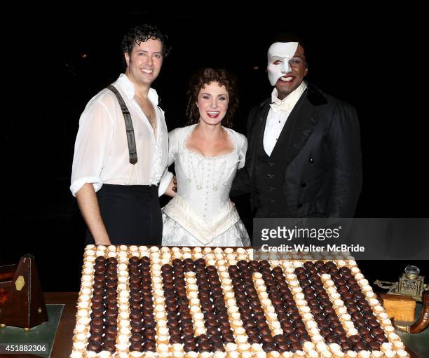 Greg Mills, Norm Lewis and Sierra Boggess backstage at the "Phantom Of The Opera" 11,000th Broadway Celebration at the Majestic Theatre on July 8,...