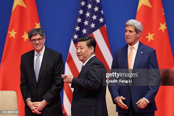 Chinese President Xi Jinping , U.S. Secretary of State John Kerry and U.S. Treasury Secretary Jack Lew attend the opening ceremony of the 6th...