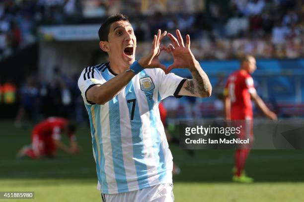 Angel Di Maria of Argentina celebrates scoring during the 2014 FIFA World Cup Brazil Round of 16 match between Argentina and Switzerland at The Arena...