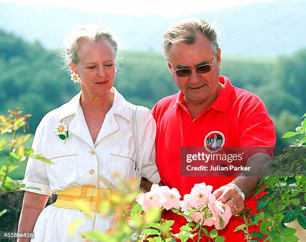 Queen Margrethe of Denmark, and Prince Henrik attend a Photocall, at their Summer House, Chateau de Cayx in Luzech, on August 7 in Luzech, France.