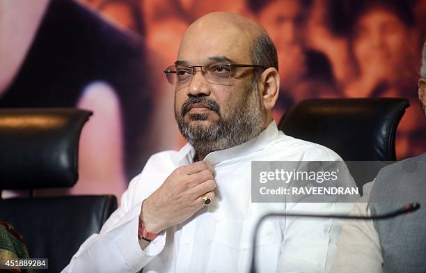 Bharatiya Janata Party new president Amit Shah looks on during his appointment cerremony in New Delhi on July 9, 2014. Indian Prime Minister Narendra...