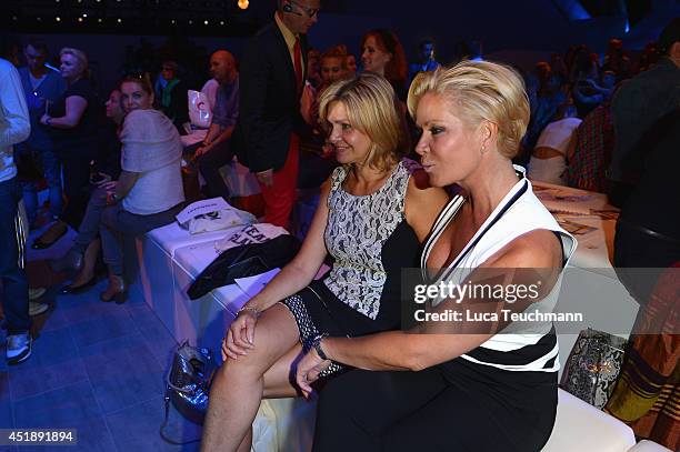 Maren Gilzer and Claudia Effenberg attend the Glaw show during the Mercedes-Benz Fashion Week Spring/Summer 2015 at Erika Hess Eisstadion on July 9,...
