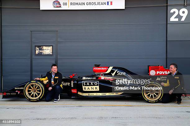 Paul Hembery , Motorsport Director of Pirelli poses with the new 18-inch Pirelli wheels, fitted on a Lotus, before demonstration runs during day two...