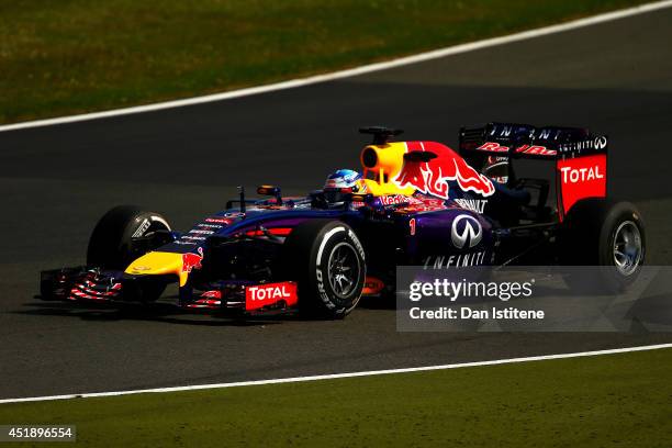 Sebastian Vettel of Germany and Infiniti Red Bull Racing drives during day two of testing at Silverstone Circuit on July 9, 2014 in Northampton,...