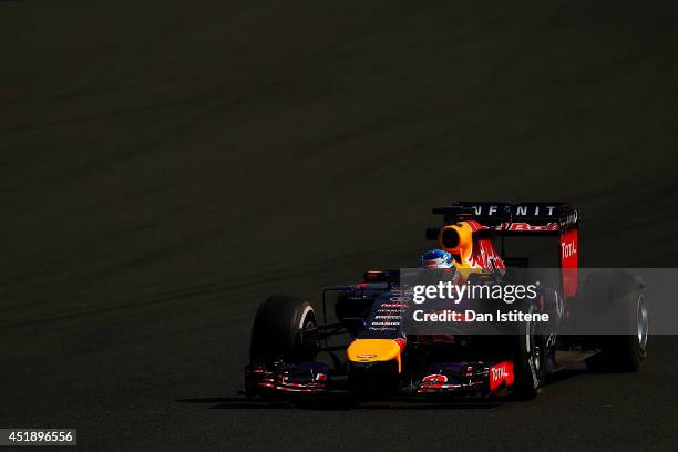 Sebastian Vettel of Germany and Infiniti Red Bull Racing drives during day two of testing at Silverstone Circuit on July 9, 2014 in Northampton,...