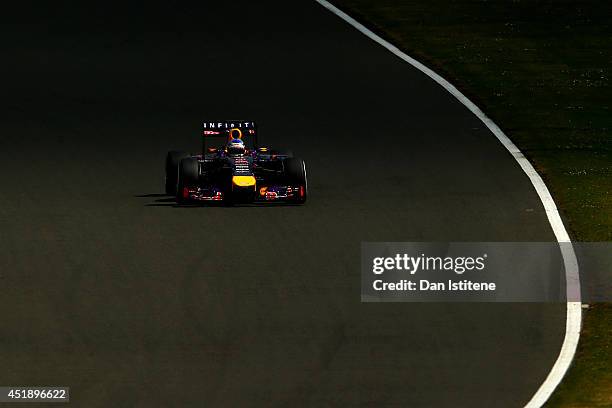 Sebastian Vettel of Germany and Infiniti Red Bull Racing drives during day two of testing at Silverstone Circuit on July 9, 2014 in Northampton,...