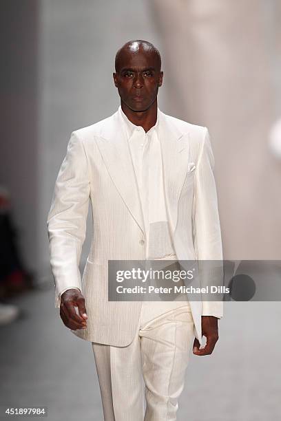 Bruce Darnell walks the runway at the Minx by Eva Lutz show during the Mercedes-Benz Fashion Week Spring/Summer 2015 at Erika Hess Eisstadion on July...