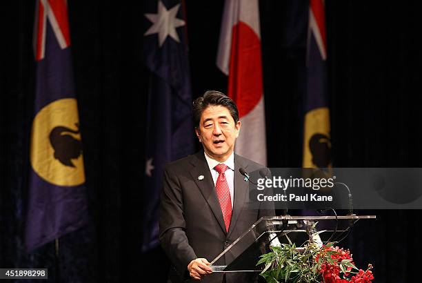 Japanese Prime Minister Shinzo Abe addresses invited guests during an official dinner at the Crown Perth on July 9, 2014 in Perth, Australia. Prime...