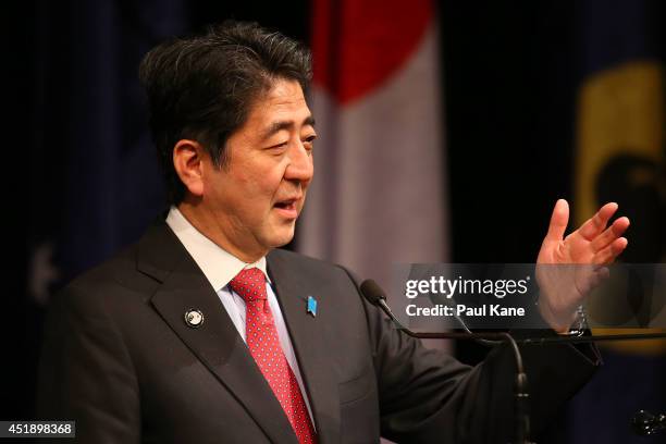 Japanese Prime Minister Shinzo Abe addresses invited guests during an official dinner at the Crown Perth on July 9, 2014 in Perth, Australia. Prime...