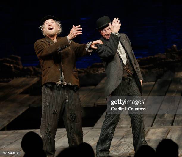 Actors Ian McKellen and Patrick Stewart perform a dance during curtain call at the opening night of "Waiting For Godot" at the Cort Theatre on...