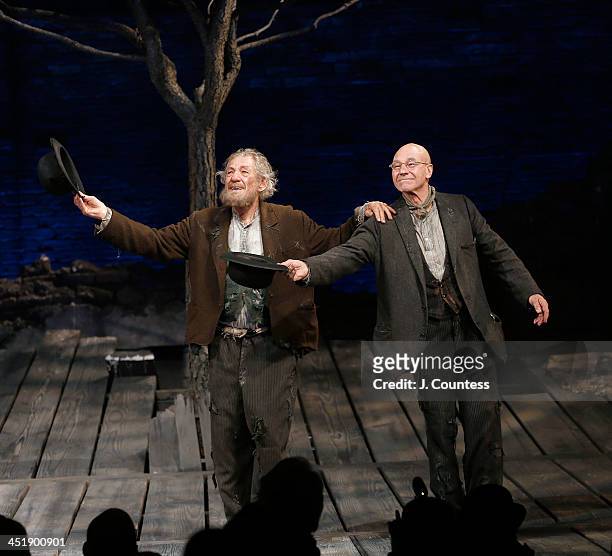 Actors Ian McKellen and Patrick Stewart perform a dance during curtain call at the opening night of "Waiting For Godot" at the Cort Theatre on...