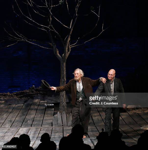 Actors Ian McKellen and Patrick Stewart perform a dance during curtain call at the opening night of "Waiting For Godot" at the Cort Theatre on...