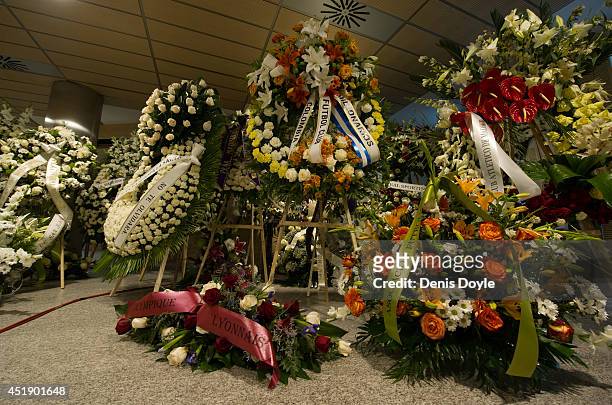 Flowers sent by football clubs from around the world are seen at the funeral wake of former Real Madrid great Alfredo Di Stefano at the Santiago...