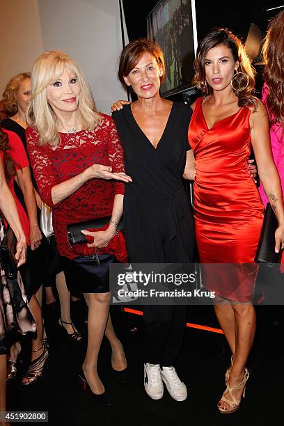 Amanda Lea, Eva Lutz and Elisabetta Canalis attend the Minx by Eva Lutz show during the Mercedes-Benz Fashion Week Spring/Summer 2015 at Erika Hess...