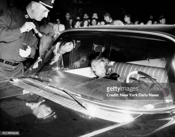 Janice Drake lies dead in a car with mobster Little Augie Pisano at 94th St. And 24th Ave. In Queens.