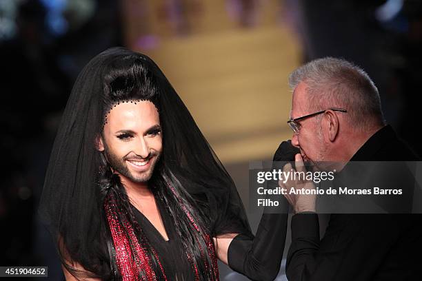 Conchita Wurst,Jean Paul Gaultier walk the runway during the Jean Paul Gaultier show as part of Paris Fashion Week - Haute Couture Fall/Winter...