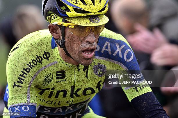 Spain's Alberto Contador rides in the pack during the 152,5 km fifth stage of the 101st edition of the Tour de France cycling race on July 9, 2014...