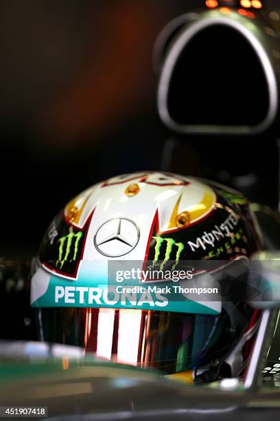 Lewis Hamilton of Great Britain and Mercedes GP sits in his car in the garage during day two of testing at Silverstone Circuit on July 9, 2014 in...