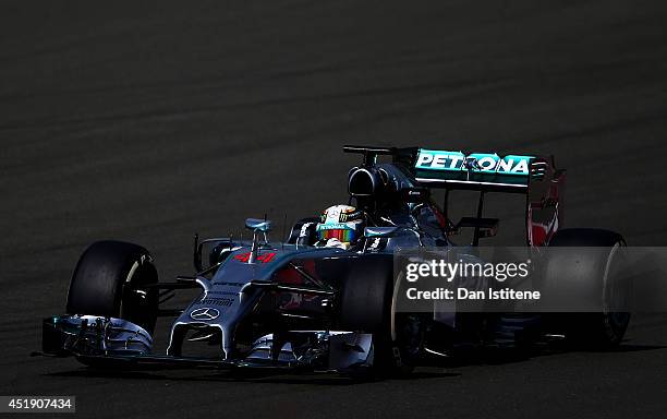 Lewis Hamilton of Great Britain and Mercedes GP drives during day two of testing at Silverstone Circuit on July 9, 2014 in Northampton, England.