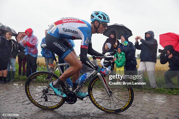 Johan Van Summeren of Belgium and Garmin-Sharp in action on the pave during the fifth stage of the 2014 Tour de France, a 155km stage between Ypres...
