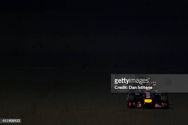 Sebastian Vettel of Germany and Infiniti Red Bull Racing drives during day two of testing at Silverstone Circuit on July 9, 2014 in Northampton,...