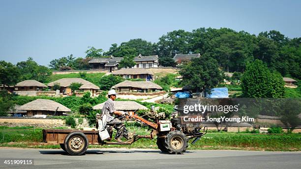 A farmer drives transformed cultivator at Yandong village. It is a traditional village located in Gangdong-myeon, Gyeongju, Gyeongsangbuk-do, South...