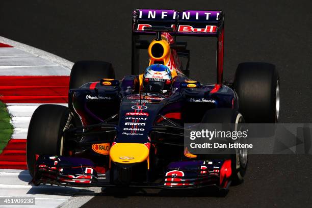 Sebastian Vettel of Germany and Infiniti Red Bull Racing drives during day two of testing at Silverstone Circuit on July 9, 2014 in Northampton,...