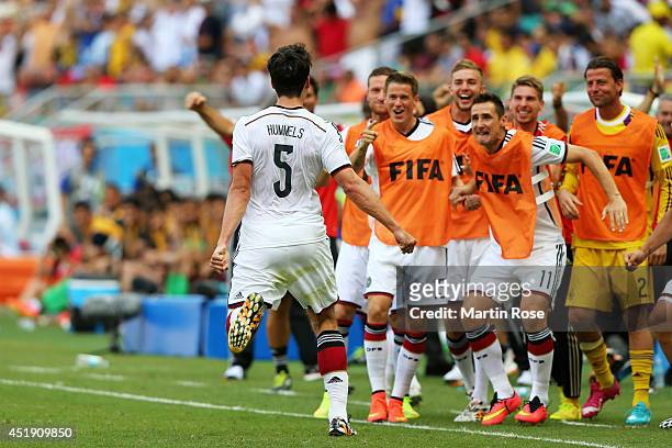 Mats Hummels of Germany celebrates scoring his team's second goal during the 2014 FIFA World Cup Brazil Group G match between Germany and Portugal at...