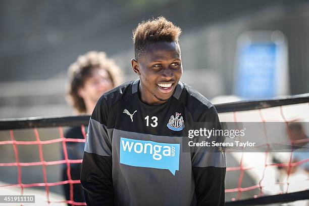 Newcastle player Mapou Yanga-Mbiwa smiles during a Newcastle United Training Session at the Longsands beach in Tynemouth on July 09 in Newcastle upon...