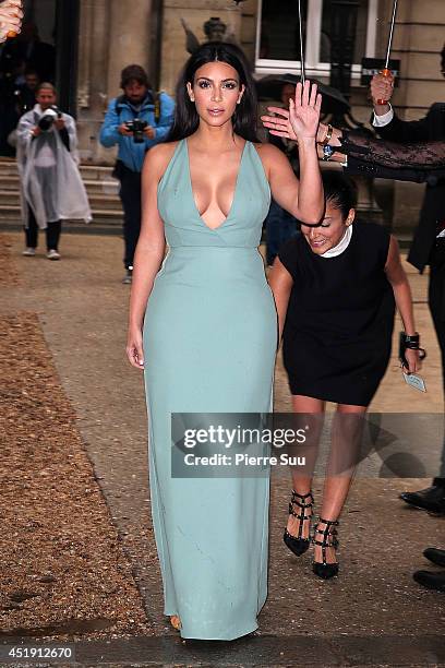 Kim Kardashian attends the Valentino show as part of Paris Fashion Week - Haute Couture Fall/Winter 2014-2015 at Hotel Salomon de Rothschild on July...