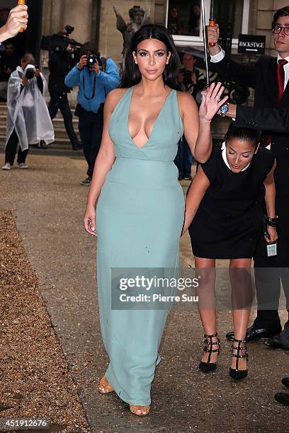 Kim Kardashian attends the Valentino show as part of Paris Fashion Week - Haute Couture Fall/Winter 2014-2015 at Hotel Salomon de Rothschild on July...