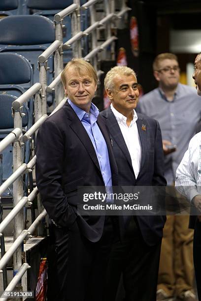 Owners Wesley Edens & Marc Lasry await the announcement of their new head coach Jason Kidd to the Milwaukee Bucks at BMO Harris Bradley Center on...