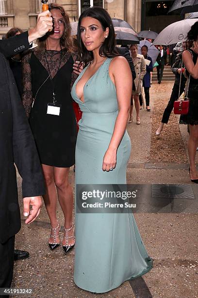 Kim Kardashian attends the Valentino show as part of Paris Fashion Week - Haute Couture Fall/Winter 2014-2015 at Hotel Salomon de Rothschild on July...