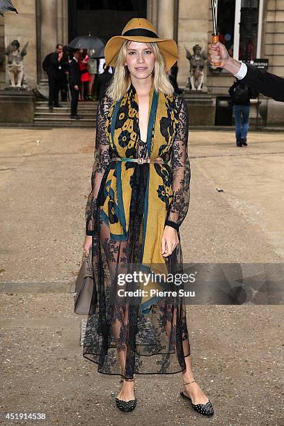 Elena Perminova attends the Valentino show as part of Paris Fashion Week - Haute Couture Fall/Winter 2014-2015 at Hotel Salomon de Rothschild on July...