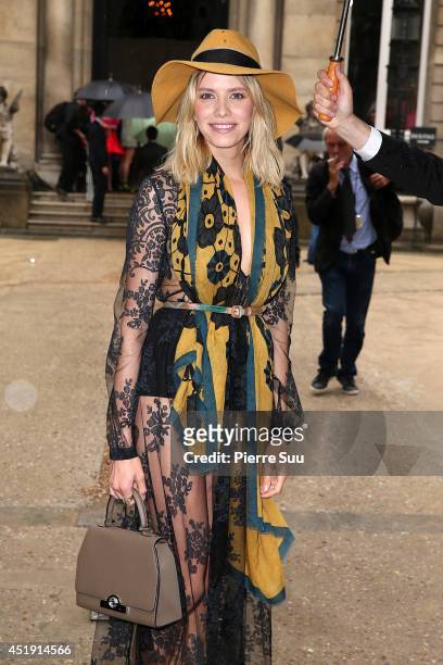 Elena Perminova attends the Valentino show as part of Paris Fashion Week - Haute Couture Fall/Winter 2014-2015 at Hotel Salomon de Rothschild on July...