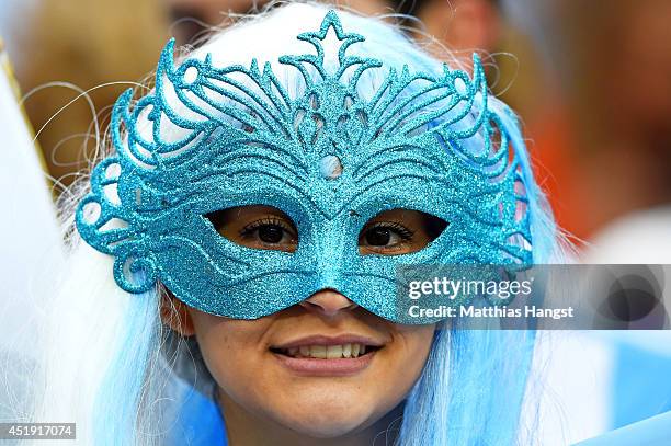 An Argentina fan enjoys the atmosphere prior to the 2014 FIFA World Cup Brazil Semi Final match between the Netherlands and Argentina at Arena de Sao...