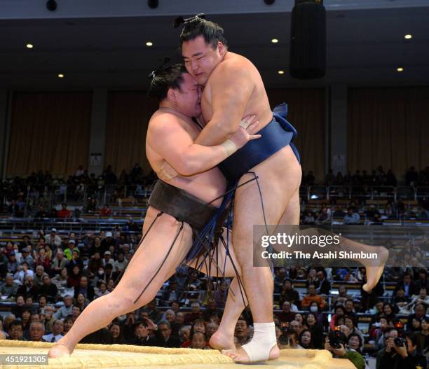 Mongolian yokozuna Hakuho , whose real name is Mnkhbatyn Davaajargal pushes his fellow ozeki Kakuryu whose real name is Mangaljalavyn Anand to win...