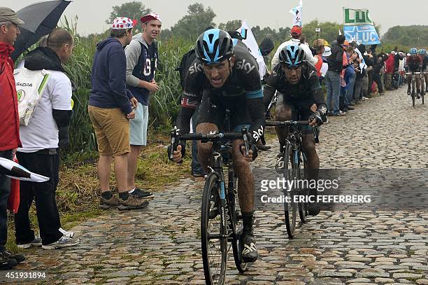 Britain's Geraint Thomas and Australia's Richie Porte ride during the 152,5 km fifth stage of the 101st edition of the Tour de France cycling race on...