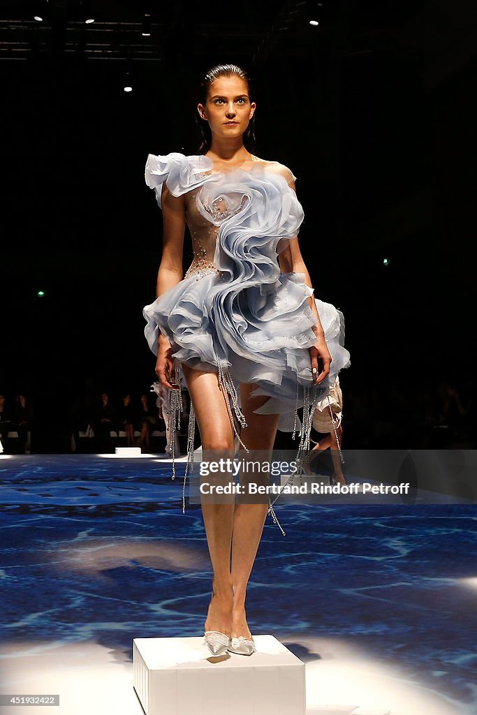 A model on the runway during the Lan YU show as part of Paris Fashion ...