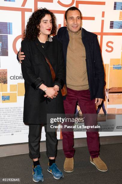 Zinedine Soualem and his daughter Mouna Soualem attend the "Casse Tete Chinois" Premiere at Cinema UGC Normandie on November 25, 2013 in Paris,...