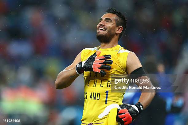 Sergio Romero of Argentina celebrates defeating the Netherlands in a shootout during the 2014 FIFA World Cup Brazil Semi Final match between the...