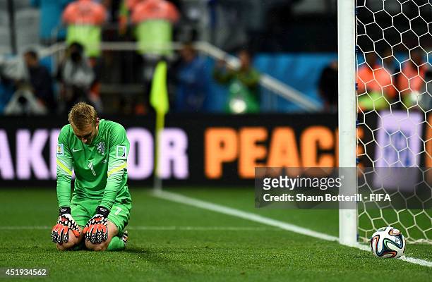 Jasper Cillessen of the Netherlands show his dejection after failing to stop the penalty by Maxi Rodriguez of Argentina in the penalty shootout in...